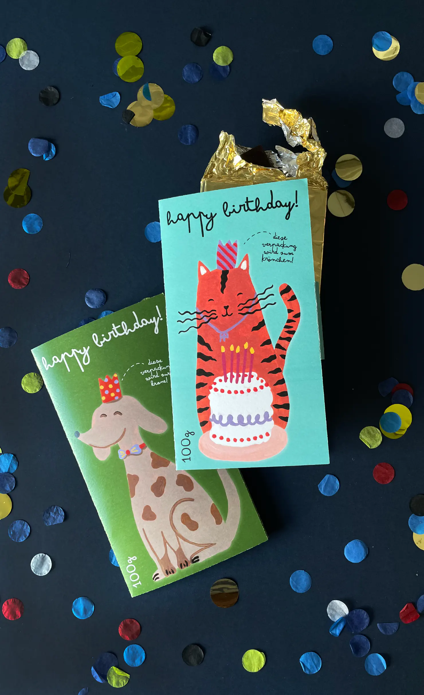 Photograph of chocolate packaging with illustrations of a cat and a dog