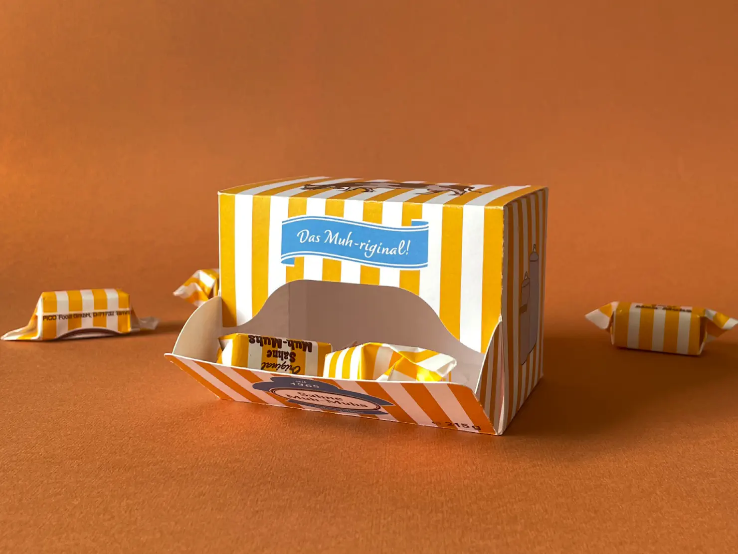 Photograph of cardboard packaging for cream fudge sweets